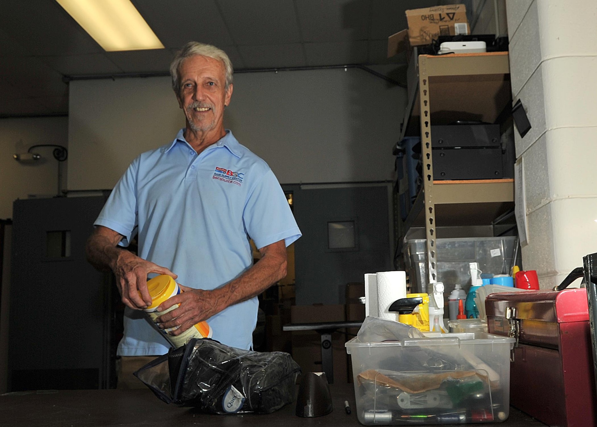 Donald Roth, a receiving clerk at the Tyndall AFB Base Supply Center, volunteers at the Tyndall AFB thrift shop, June 9, 2016. Roth has donated over 500 hours of volunteer work at the thrift shop. He now works alongside Airmen in the 325th Logistics Readiness Squadron, where they inspect equipment and material shipments. (U.S. Air Force photo by Senior Airman Ty-Rico Lea/Released)