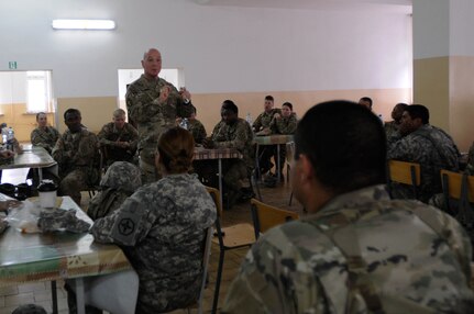 Command Sgt. Maj. Stanley O. Richards, Interim Command Sergeant Major of the  21st Theater Sustainment Command, visits with enlisted Army Reserve soldiers with the 364th Expeditionary Sustainment Command  during Anakonda 2016, in Warsaw, Poland, June 9. Anakonda 2016 is one of U.S. Army Europe's premier multinational training events, which features 24 nations and seeks to train, exercise and integrate Polish national command and force structures into an allied, joint, multinational environment. (U.S. Army photo by Sgt. Kayla F. Benson, 96th Sustainment Brigade)