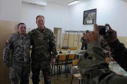 Maj. Gen. Duane A. Gamble, commander of the 21st Theater Sustainment Command, visits with enlisted Army Reserve soldiers with the 364th Expeditionary Sustainment Command  during Anakonda 2016, in Warsaw, Poland, June 9. Anakonda 2016 is one of U.S. Army Europe's premier multinational training events, which features 24 nations and seeks to train, exercise and integrate Polish national command and force structures into an allied, joint, multinational environment. (U.S. Army photo by Sgt. Kayla F. Benson, 96th Sustainment Brigade)