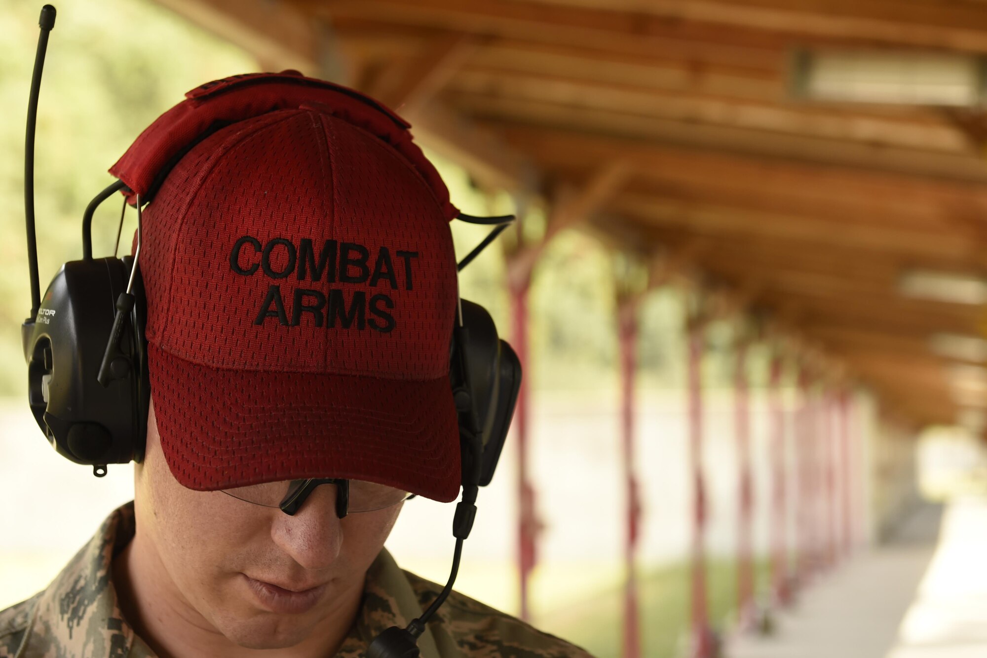 SSgt. Casey Blickenstaff, 627th Security Forces Squadron combat arms instructor, scores a target sheet during the Excellence-in-Competition event June 2, 2016, on at the range Joint Base Lewis-McChord, Wash. The event was open to all Airmen in the Pacific North West, with some coming from as far away as Oregon. (U.S. Air Force photo/Tech. Sgt. Tim Chacon)  