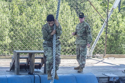 Soldiers in Basic Combat Training with Co. A, 2nd Bn., 13th Inf. Reg., swing across the top of the 40-foot Victory Tower at Fort Jackson, S.C., June 8. (U.S. Army photo by Sgt. 1st Class Brian Hamilton/ released)