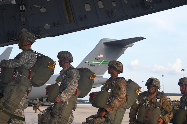 Soldiers with the 82nd Airborne Division board a 62nd Airlift Wing C-17 Globemaster III at Pope Army Air Field, North Carolina, June 4, 2016. More than 90 Soldiers boarded three C-17’s from Joint Base Lewis-McChord, Washington. (U.S. Air Force photo/Staff Sgt. Naomi Shipley)