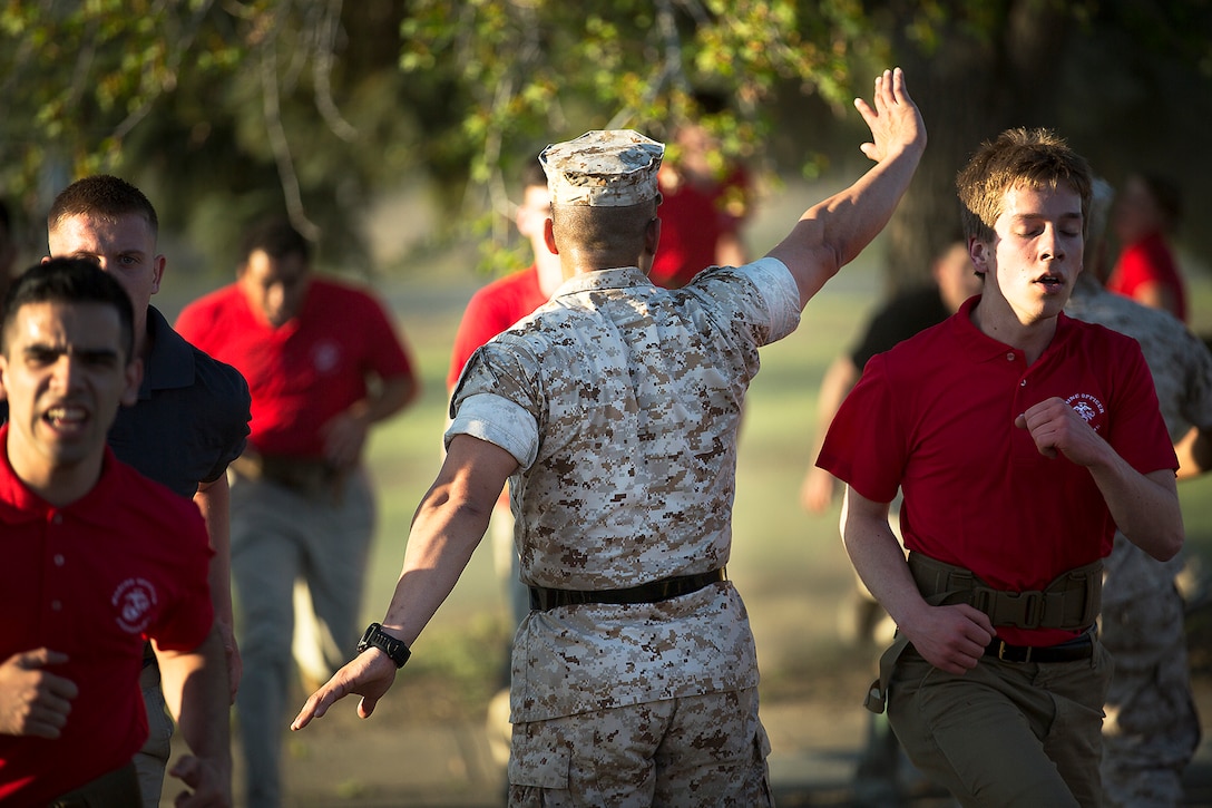 Marine Corps Staff Sgt. Keun Chung, a sergeant instructor at the Marine Corps Officer Candidates School, instructs officer candidates during an OCS preparation event at the Yakima Training Center in Yakima, Wash., April 8, 2016. Defense Secretary Ash Carter today announced proposed changes to the promotion rules for military officers in all services. Marine Corps photo by Sgt. Reece Lodder