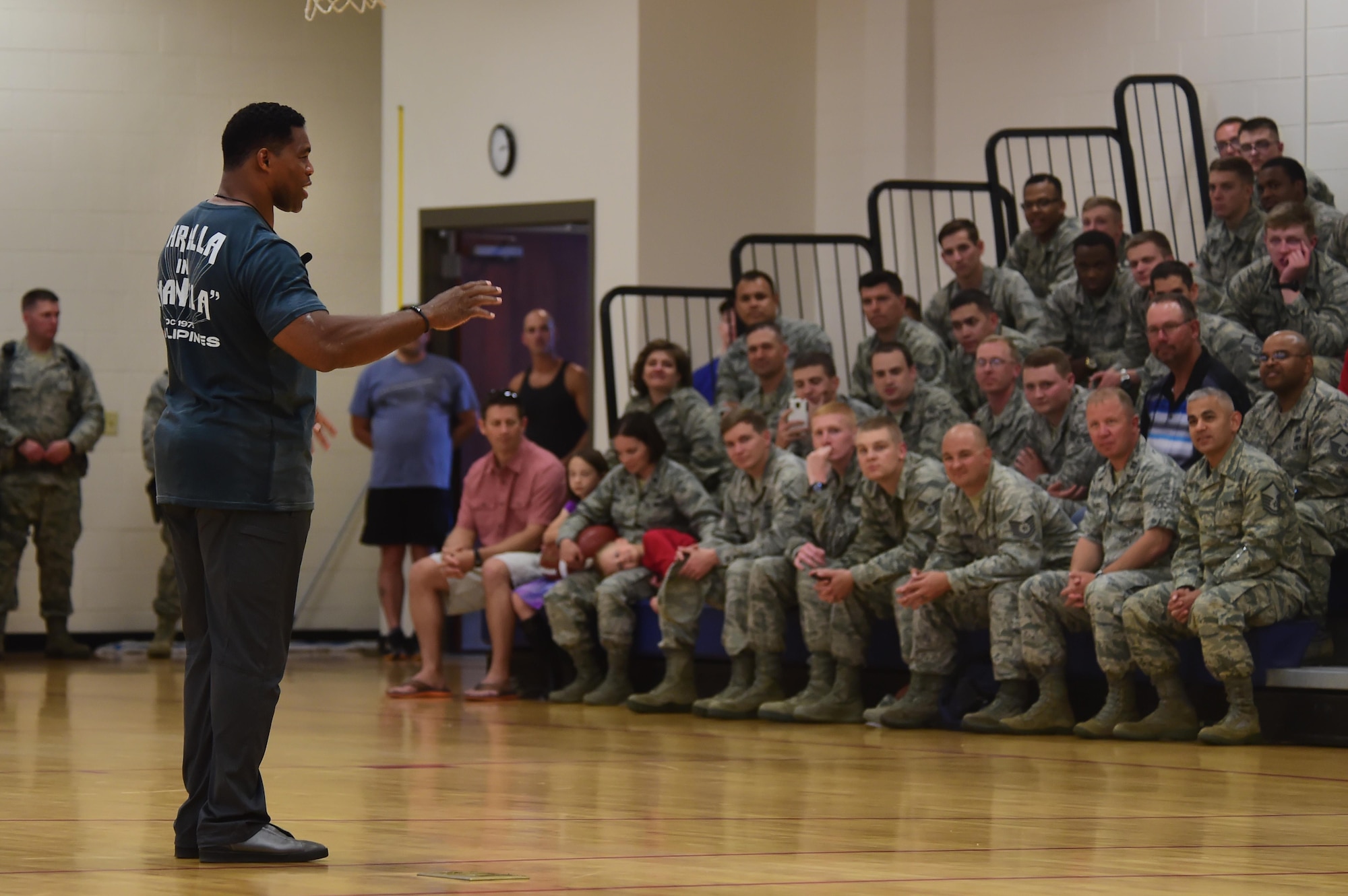Herschel Walker, former National Football League running back, speaks to an audience June 8, 2016, at the fitness center on Buckley Air Force Base, Colo. Walker spoke about his professional sports career and other business ventures he has been involved with. (U.S. Air Force photo by Airman 1st Class Luke W. Nowakowski/Released)