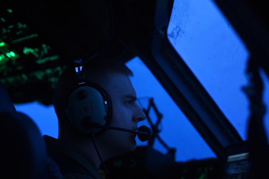 1st Lt. Patrick Schiess, 7th Airlift Wing C-17 Globemaster III pilot flys over the Pope Army Air Field Range, North Carolina on June 4, 2016. Schiess was one of three air crews from Joint Base Lewis-McChord, Wash., working with four other C-17 air crews conducting air drops for training. (U.S. Air Force photo/ Staff Sgt. Naomi Shipley)