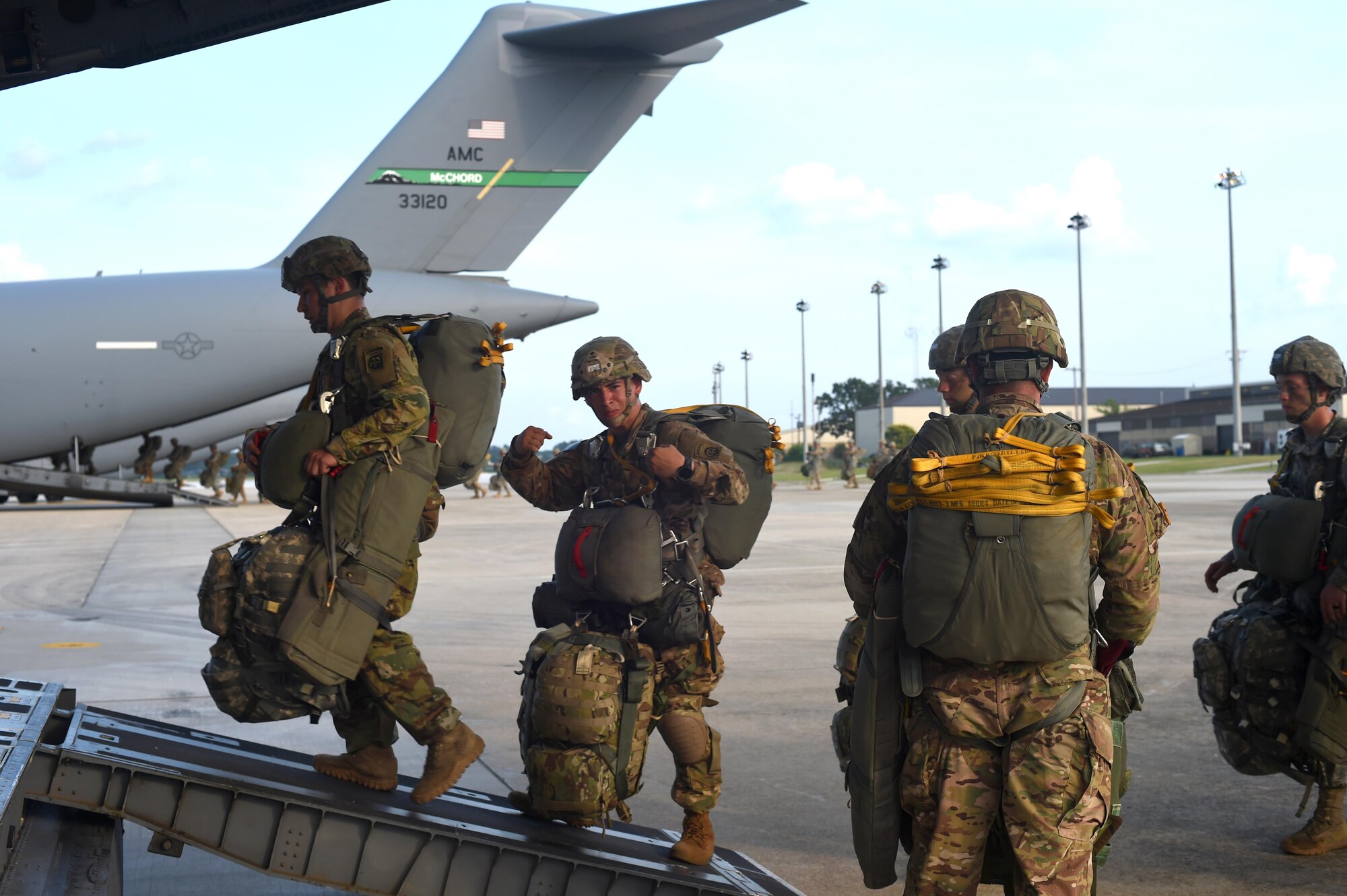 Soldiers with the 82nd Airborne Division board a 62nd Airlift Wing C-17 Globemaster III at Pope Army Air Field, North Carolina, June 4, 2016. More than 90 Soldiers boarded three C-17’s from Joint Base Lewis-McChord, Washington. (U.S. Air Force photo/Staff Sgt. Naomi Shipley)