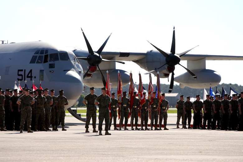 Marines with the 2nd Marine Aircraft Wing stand in formation during the 2nd MAW change of command ceremony at Marine Corps Air Station Cherry Point, N.C., June 9, 2016. Maj. Gen. Gary L. Thomas relinquished his post as the 2nd MAW commanding general to Brig. Gen. Matthew G. Glavy during the ceremony. (U.S. Marine Corps photo by Cpl. Jason Jimenez/Released)