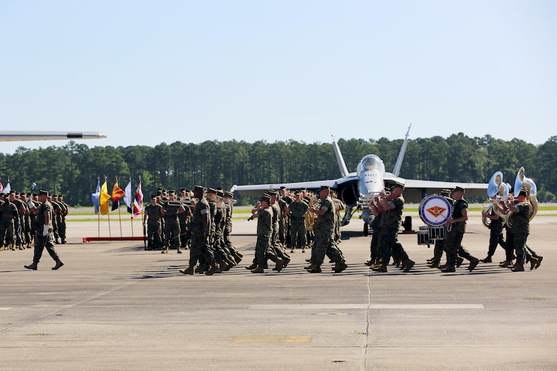 The 2nd Marine Aircraft Wing Band performs during the 2nd Marine Aircraft Wing change of command ceremony at Marine Corps Air Station Cherry Point, N.C., June 9, 2016. Maj. Gen. Gary L. Thomas relinquished his post as the 2nd MAW commanding general to Brig. Gen. Matthew G. Glavy during the ceremony. (U.S. Marine Corps photo by Lance Cpl. Mackenzie Gibson/Released)