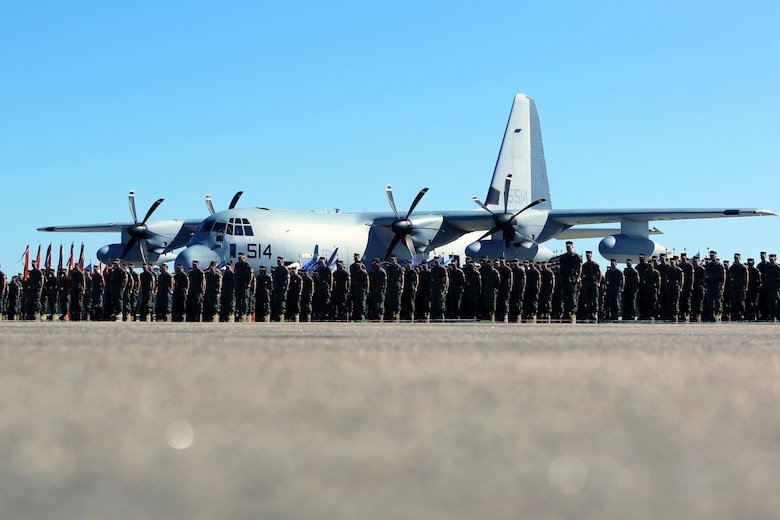 Marines with 2nd Marine Aircraft Wing stand in formation during the 2nd MAW change of command ceremony at Marine Corps Air Station Cherry Point, N.C., June 9, 2016. Maj. Gen. Gary L. Thomas relinquished his post as 2nd MAW commanding general to Brig. Gen. Matthew G. Glavy during the ceremony. (U.S. Marine Corps photo by Lance Cpl. Mackenzie Gibson/Released)