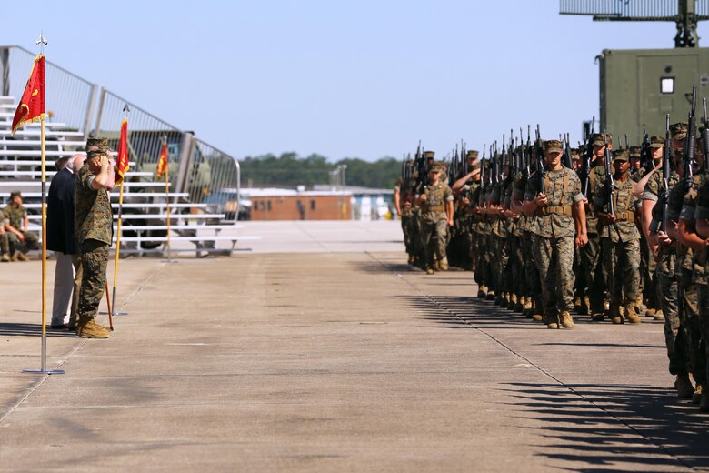 Marines with the 2nd Marine Aircraft Wing perform a pass-in-review for new commanding general, Brig. Gen. Matthew G. Glavy, during the 2nd MAW change of command ceremony at Marine Corps Air Station Cherry Point, N.C., June 9, 2016. Maj. Gen. Gary L. Thomas relinquished his post as the 2nd MAW commanding general to Glavy during the ceremony. (U.S. Marine Corps photo by Lance Cpl. Mackenzie Gibson/Released)