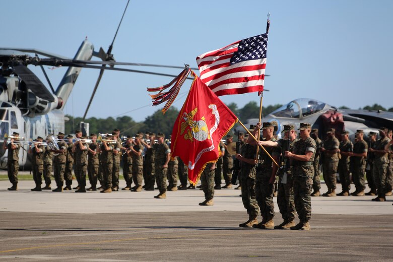 Marines with the 2nd Marine Aircraft Wing perform a pass-in-review for new commanding general, Brig. Gen. Matthew G. Glavy during the 2nd MAW change of command ceremony at Marine Corps Air Station Cherry Point, N.C., June 9, 2016. Maj. Gen. Gary L. Thomas relinquished his post as the 2nd MAW commanding general to Glavy during the ceremony. (U.S. Marine Corps photo by Cpl. N. W. Huertas/Released)