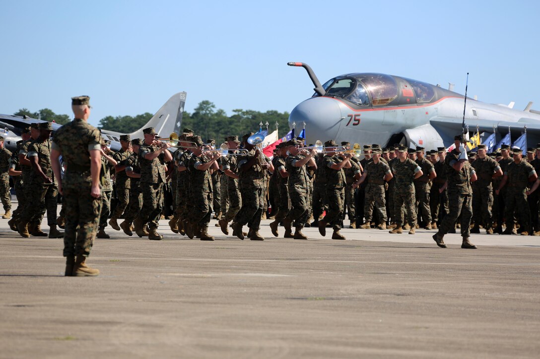 The 2nd Marine Aircraft Wing Band performs during the 2nd Marine Aircraft Wing change of command ceremony at Marine Corps Air Station Cherry Point, N.C., June 9, 2016. Maj. Gen. Gary L. Thomas relinquished his post as the 2nd MAW commanding general to Brig. Gen. Matthew G. Glavy during the ceremony. (U.S. Marine Corps photo by Cpl. N. W. Huertas/Released)
