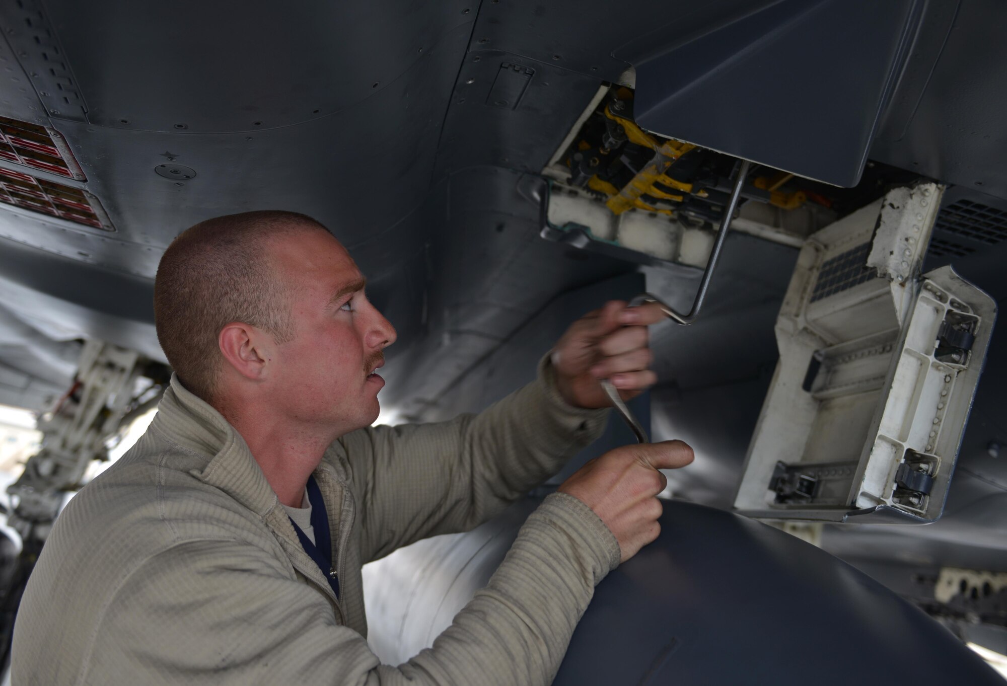 U.S. Air Force Airman 1st Class Zachary Suttles, a crew chief assigned to the 494th Aircraft Maintenance Unit out of Royal Air Force Lakenheath, England, performs maintenance on an F-15E Strike Eagle dual-role fighter aircraft June 8, 2016, during RED FLAG-Alaska (RF-A) 16-2 at Eielson Air Force Base, Alaska. RF-A is a Pacific Air Forces commander-directed field training exercise for U.S. and allied forces, providing joint offensive counter-air, interdiction, close air support, and large force employment training in a simulated combat environment. (U.S. Air Force photo by Airman Isaac Johnson)