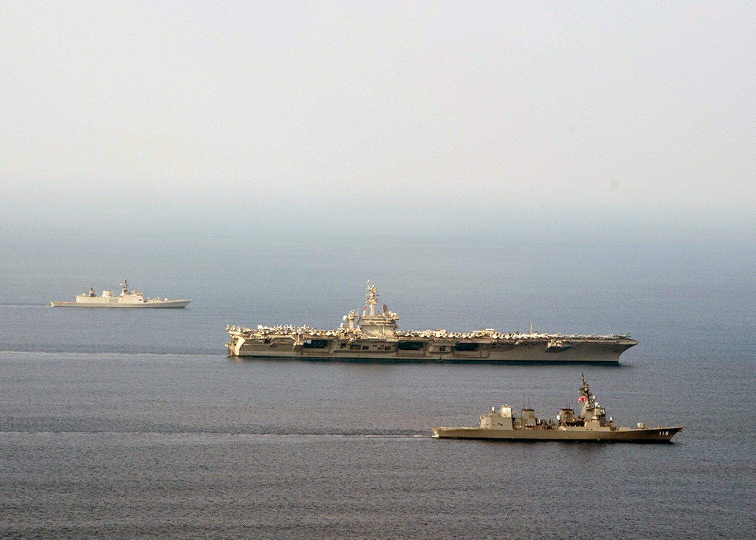 U.S. Navy official File Photo: INDIAN OCEAN (Oct. 16, 2015) The aircraft carrier USS Theodore Roosevelt (CVN 71), Japanese Maritime Self-Defense destroyer Fuyuzuki and Indian Shivalik-class frigate Shivalik transit into formation during a photo exercise as a part of Exercise Malabar 2015. Malabar is a continuing series of complex, high-end war fighting exercises conducted to advance multi-national maritime relationships and mutual security. Theodore Roosevelt is operating in the U.S. 7th Fleet area of operations as part of a worldwide deployment en route toits new homeport in San Diego to complete a three-carrier homeport shift. 