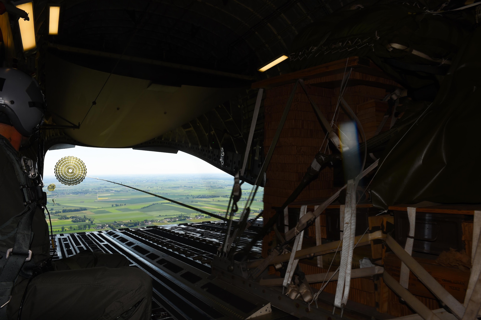 A British Howitzer is air dropped into Poland on June 6, 2016. The 62nd Airlift Wing and various C-17 Globemaster III units participated in Exercise Swift Response 2016 to demonstrate multi-national joint operations in Europe. (Air Force photo/Staff Sgt. Naomi Shipley)