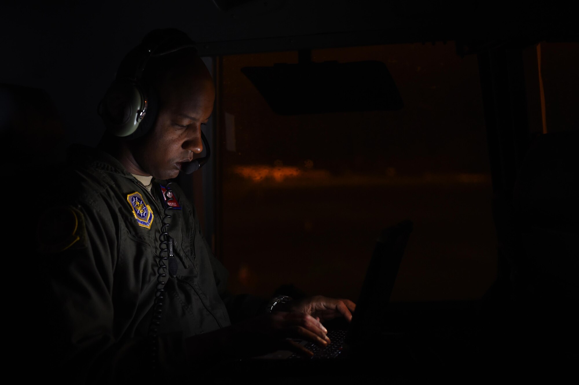 Lt. Col. Jaron Roux, 62nd Operation Support Squadron commander, prepares for departure on a C-17 Globemaster III on Pope Army Air Field, N.C. on June 6, 2016. Roux’s aircrew along with two other McChord crews made a more than nine-hour flight to Poland during Exercise Swift Response 2016. (Air Force photo/Staff Sgt. Naomi Shipley)