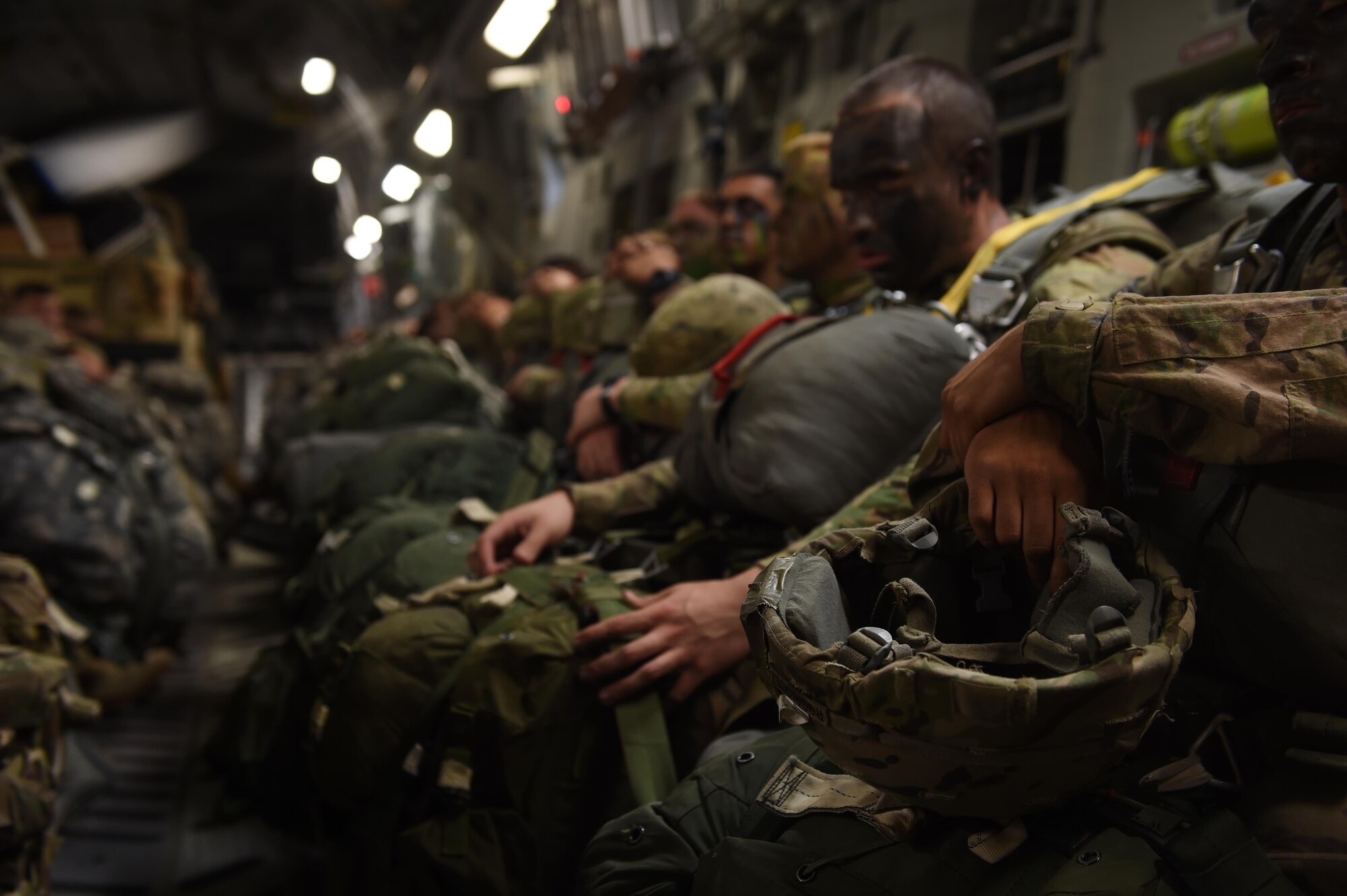 82nd Airborne Division Paratroopers prepare to jump from a 62nd Airlift Wing C-17 Globemaster III into Poland on June 6, 2016 during Exercise Swift Response 2016.  The Paratroopers endured a more than nine hour flight to the drop zone where one by one they static line jumped from the C-17. (Air Force photo/Staff Sgt. Naomi Shipley)