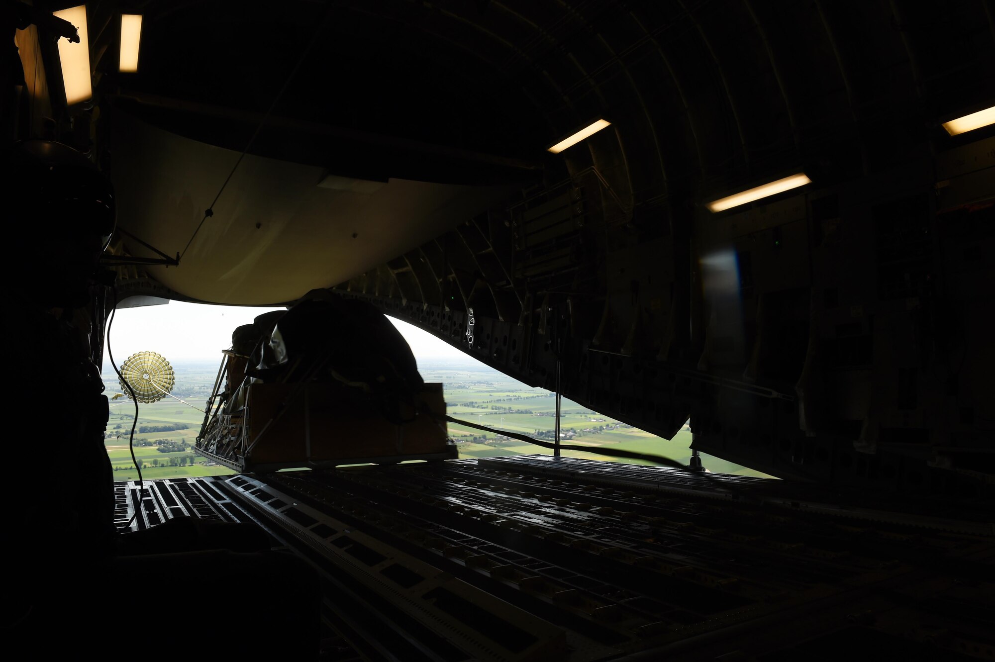 A British Howitzer is air dropped into Poland on June 6, 2016. The 62nd Airlift Wing air dropped the Howitzer, a Humvee and more than 250 soldiers into Poland for Exercise Swift Response 2016, where more than 10 North Atlantic Treaty Organization nations including the United States trained to execute Rapid Global Mobility. (Air Force photo/Staff Sgt. Naomi Shipley)