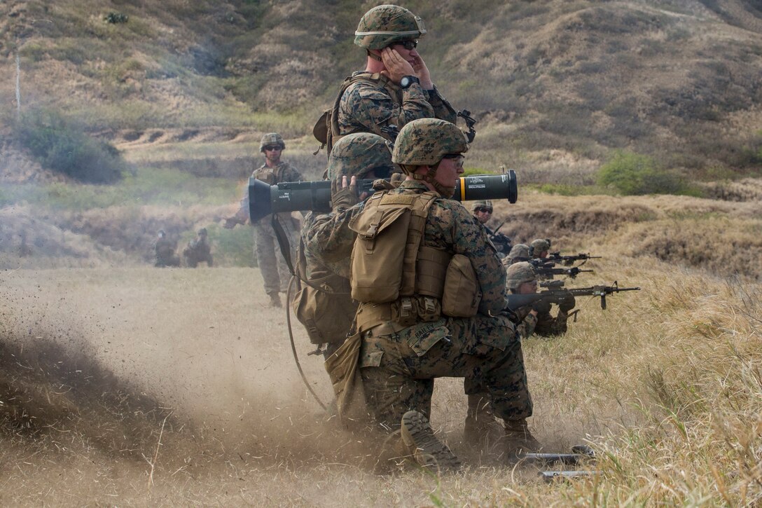 A Marine with Echo Company, 2nd Battalion, 3rd Marine Regiment, fires a M136 AT4 Anti-tank rocket launcher at an armored target during a squad attack exercise at Kaneohe Bay Range Training Facility aboard Marine Corps Base Hawaii, April 21, 2016. The purpose of this exercise was to help team and squad leaders improve their combat assault capabilities as a cohesive unit with fire support from mortars and machine gun suppression. Echo Marines buddy-rushed targets using live rounds, set up an ambush with a claymore and used rocket fire to suppress armored targets.