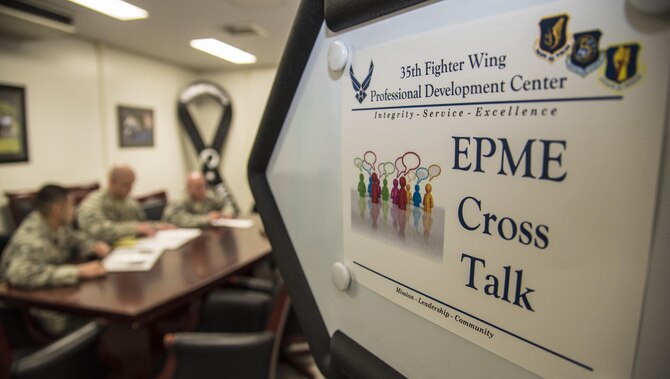 U.S. Air Force NCOs gather for an Enlisted Professional Military Education study session, called CrossTalk, at Misawa Air Base, Japan, June 9, 2016. EPME educates Airmen on official skills required of them at specific milestones throughout their careers. The distance learning portion of EPME consists of two different curriculums, Course 15 for staff sergeants in the process of becoming technical sergeants and Course 14 for technical sergeants becoming master sergeants. (U.S. Air Force photo by Airman 1st Class Jordyn Fetter)