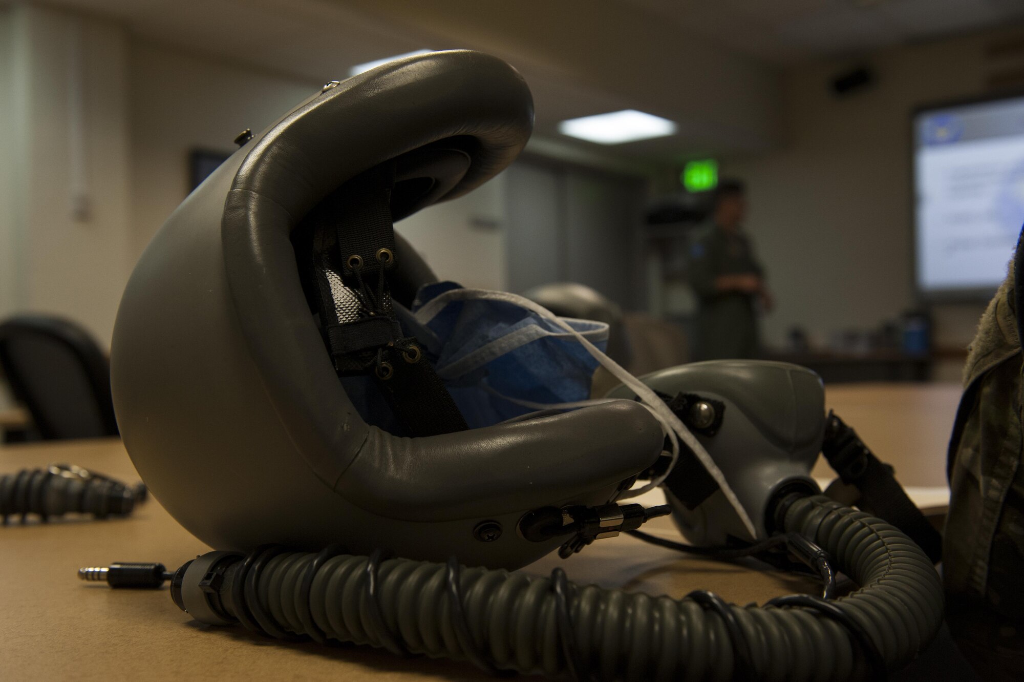 A helmet and mask utilized by parachutists sits ready to use for training June 8, 2016, at Kadena Air Base, Japan. The 18th Aerospace Medicine Squadron Aerospace and Operational Physiology Team (AOPT) hosted a joint hypoxia training event. Part of AOPT’s mission to provide this training frequently and to different branches of service. (U.S. Air Force photo by Airman 1st Class Lynette M. Rolen)