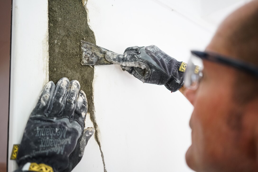 U.S. Air Force Master Sgt. Russell Hunt, a structures craftsman with the 116th Civil Engineer Squadron, Georgia Air National Guard, patches a hole around a door frame at a Yerevan elderly institution during a European Command Humanitarian Civic Assistance project in Yerevan, Armenia, May 13, 2016.   During the project, Airmen from the 116th Civil Engineer Squadron and the 461st Air Control Wing, wing staff, worked in partnership with the Armenian people to renovate a Yerevan elderly institution.  The renovation provided crucial skill set training for the civil engineers while continuing the long-lasting friendship between the Armenian people and the citizens of the United States. (U.S. Air National Guard photo by Senior Master Sgt. Roger Parsons)

