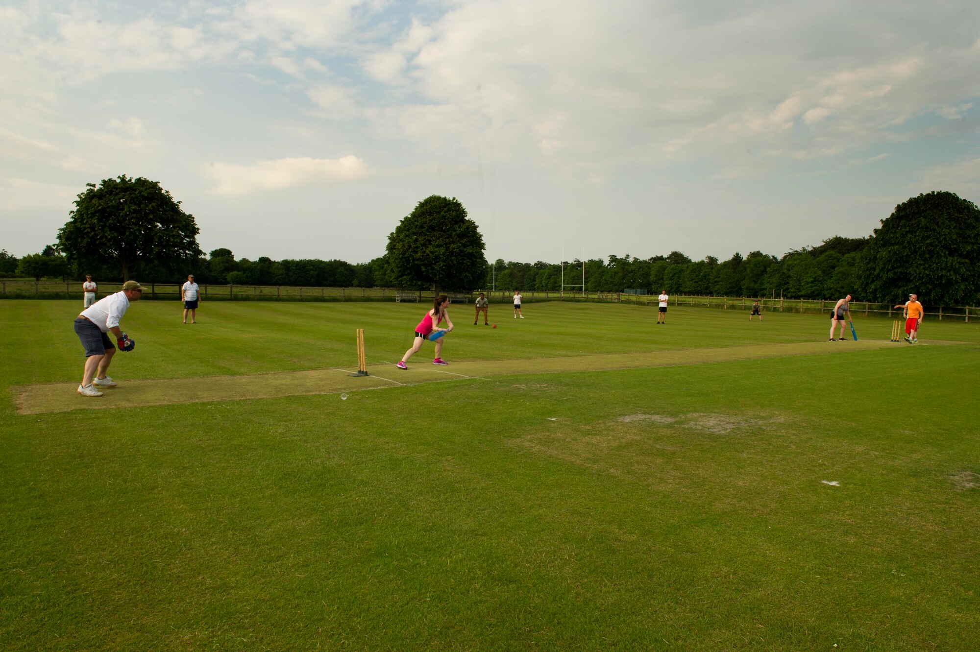 U.S. Air Force members deployed to Royal Air Force Fairford, United Kingdom, play cricket at the Fairford Cricket Club, June 8, 2016. The service members joined with locals from the area to learn the sport and build camaraderie between the community and the base. (U.S. Air Force photo/Senior Airman Sahara L. Fales)