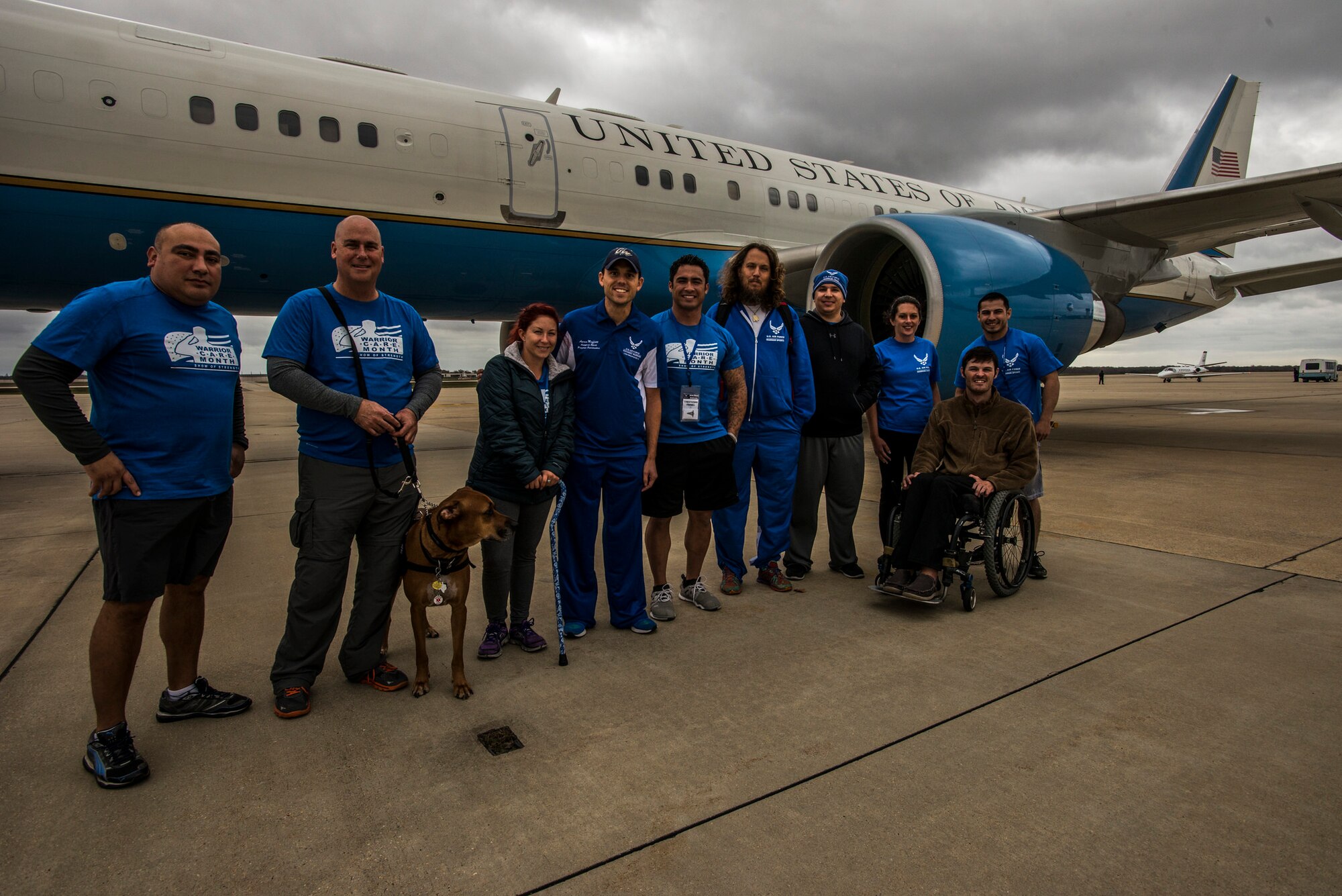 Air Force Wounded Warriors (including Staff Sgt. Vincent Cavazos, 11th Security Forces Squadron (far right), and Tech. Sgt. Christopher Ferrell, 11th Civil Engineer Squadron explosive ordnance disposal technician (sixth from the right)) pose during an 89th Airlift Wing C-32A tour at Joint Base Andrews, Md., Nov. 15, 2015. Cavazos and Ferrell are Air Force Wounded Warriors and will compete at the Department of Defense 2016 Warrior Games June 16-21, 2016. (U.S. Air Force photo by Senior Master Sgt. Kevin Wallace)
