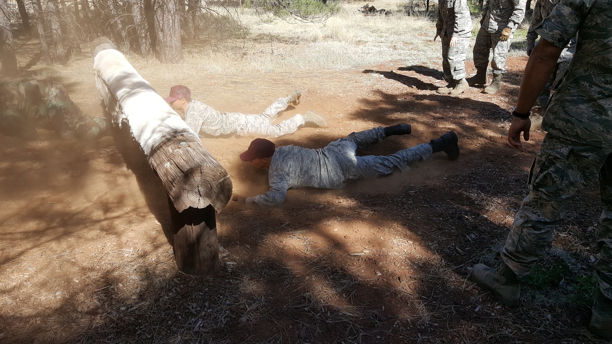 Air Force Junior Reserve Officer Training Corps  cadets participate in a teambuilding exercise during a JROTC Leadership Course May 27 to June 3 at Camp Navajo, Flagstaff, Ariz. The JROTC Cadet Leadership Course is an annual week-long summer camp that provides an opportunity for cadets from different schools and backgrounds to come together and learn about leadership, teamwork, respect for others and the Air Force core values. (Courtesy photo)