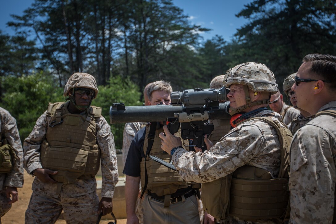 The 37th Commandant of the Marine Corps, Gen. Robert B. Neller, with the 18th Sergeant Major of the Marine Corps (left), participate in a demonstration of the Shoulder-Launched Multipurpose Assault Weapon and the Multi-Role Anti-Armor Anti-Personnel Weapon System at Marine Corps Base Quantico, Virginia, June 8, 2016.