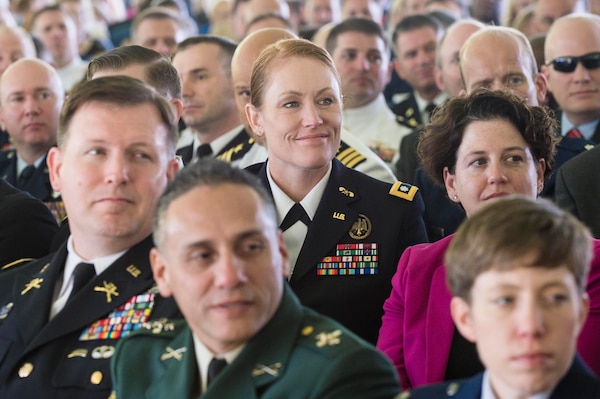 The audience watches as Marine Corps Gen. Joe Dunford, chairman of the Joint Chiefs of Staff, delivers the commencement speech during the National Defense University's 2016 graduation ceremony at Fort Lesley J. McNair in Washington, D.C., June 9, 2016. The university provides military education to senior leaders. DoD photo by Army Staff Sgt. Sean K. Harp
