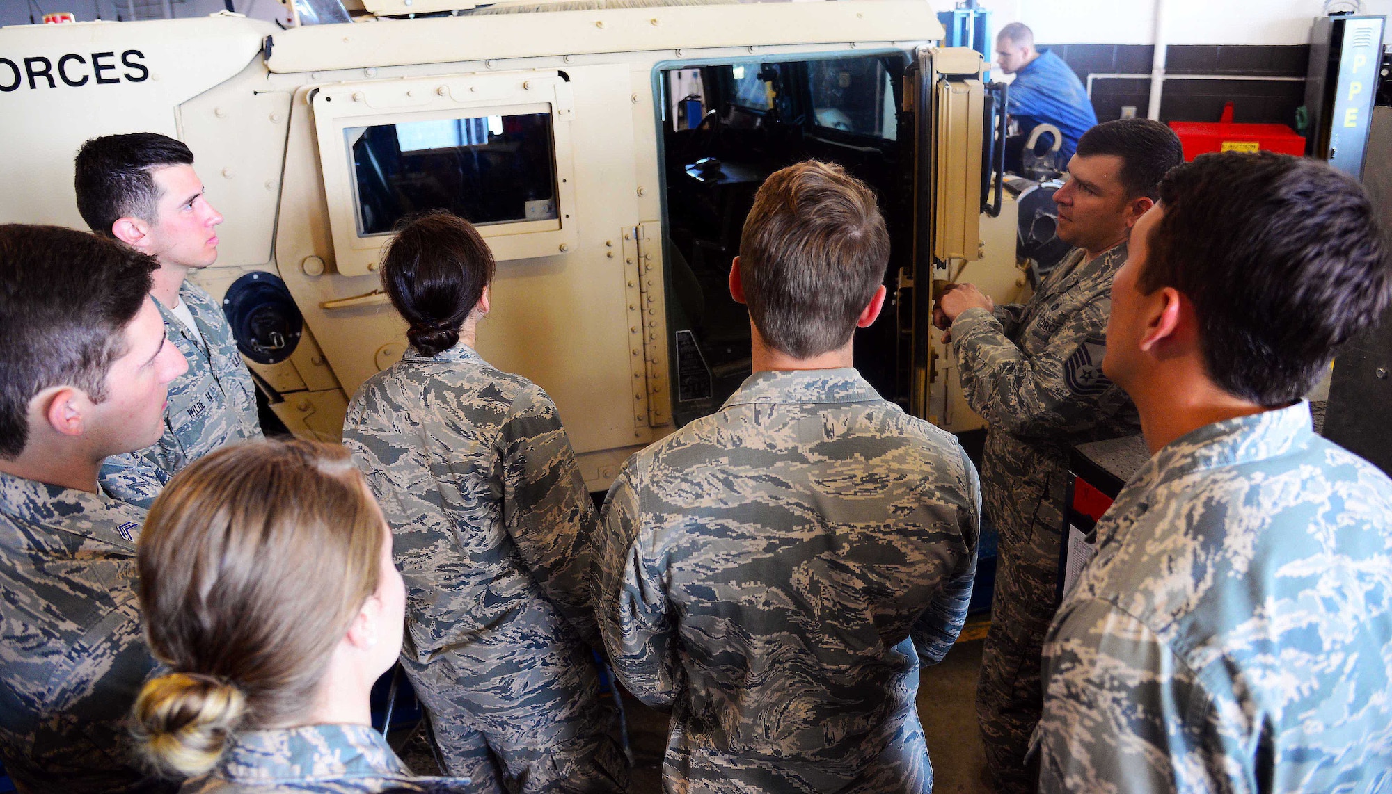 Master Sgt. Wayne Simmons, 341st Logistics Readiness Squadron vehicle fleet manager, briefs Air Force Academy cadets June 8, 2016, at Malmstrom Air Force Base, Mont. The cadets spent two weeks immersed in several groups and squadrons assigned to the 341st Missile Wing to observe operations, support functions, officer and enlisted duties and roles and have the chance to interact with active duty service members and civilian employees on base. (U.S. Air Force photo/Airman 1st Class Magen M. Reeves)