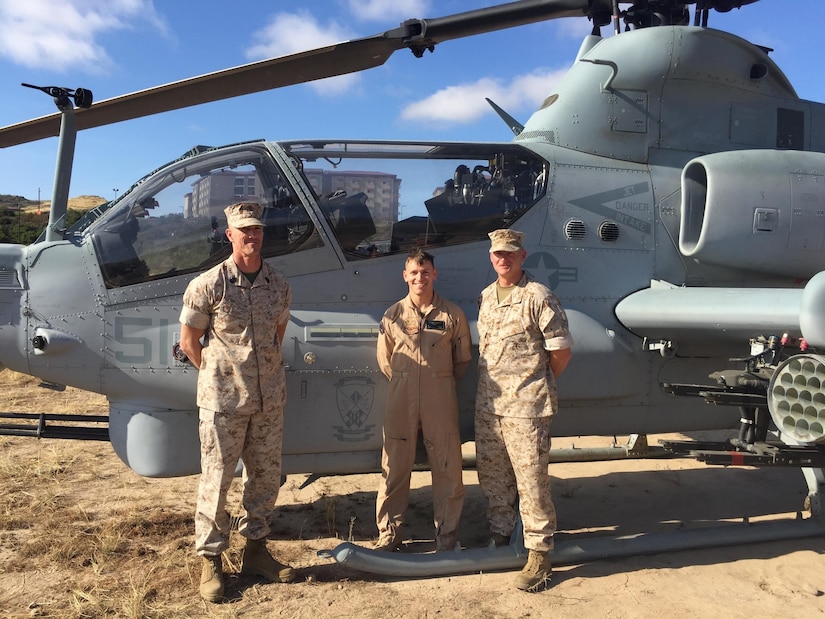 Capt. Jason Grimes, a UH-1Z Cobra pilot with Marine Light Attack Squadron (HMLA) 369 and a Hibbing, Minnesota, native, stands with the leadership of 2nd Battalion, 5th Marine Regiment in Marine Corps Base Camp Pendleton, Calif. Grimes completed the Aviator Immersion Program with the assistance of 2nd Battalion, 4th Marine Regiment and 2/5.