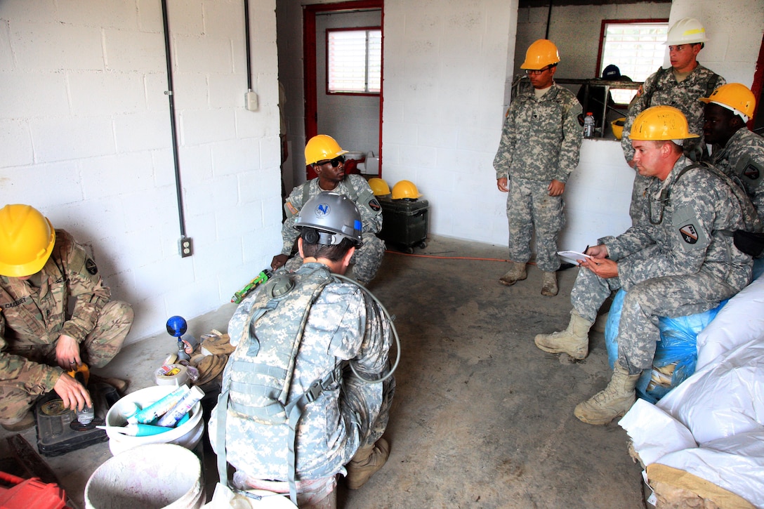 Soldiers receive instructions before cleaning up as they build a new school for Guatemalan children during Beyond the Horizon 2016 in Tocache, Guatemala, June 2, 2016. Army photo by Spc. Tamara Cummings