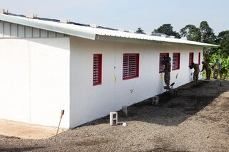 Soldiers work on windows as they build a new school for Guatemalan children during Beyond the Horizon 2016 in Tocache, Guatemala, June 2, 2016. The soldiers are assigned to the 1021st Engineer Company. Army photo by Spc. Tamara Cummings