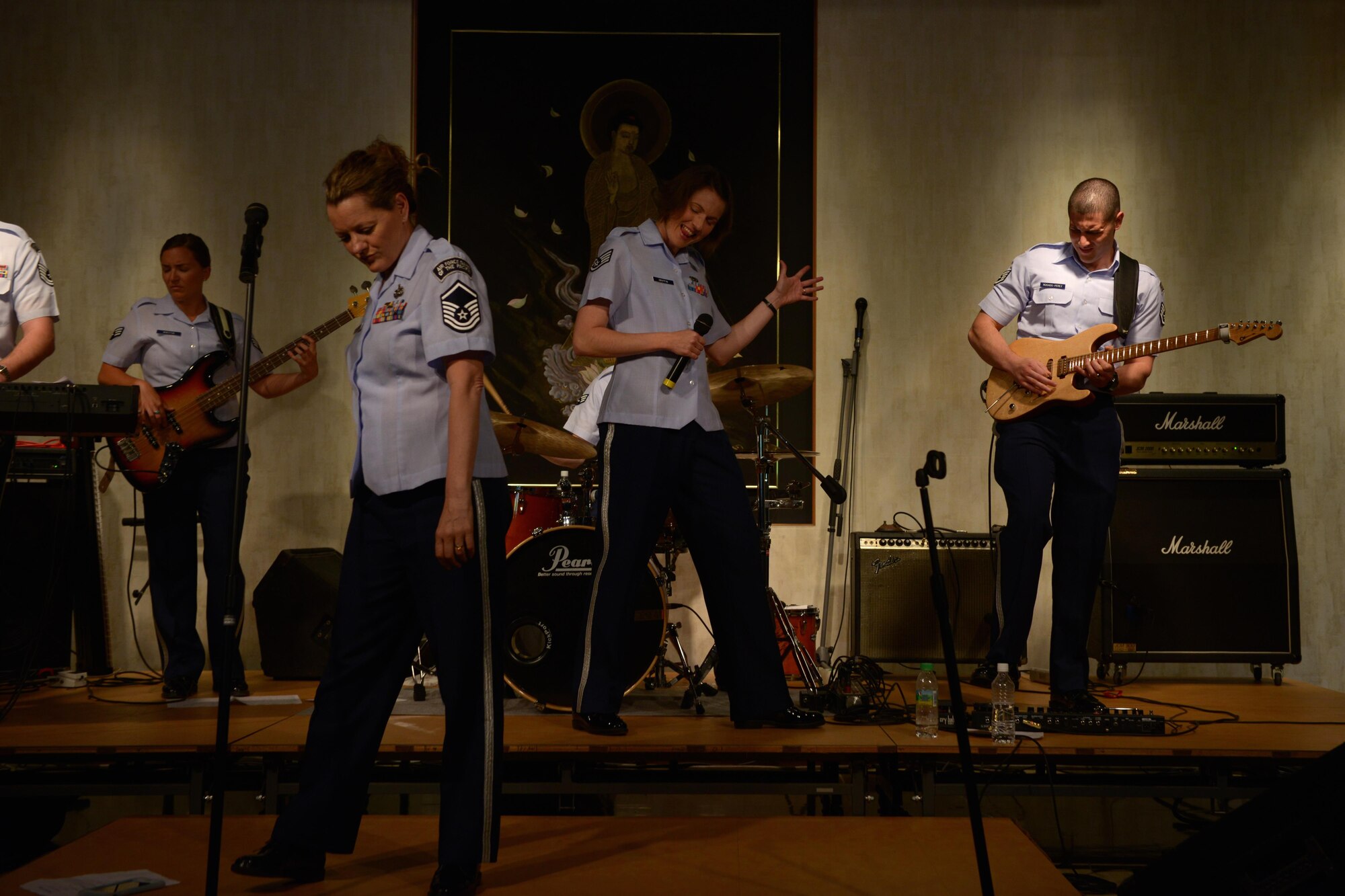 The Band of the Pacific-Asia performs for a crowd during the Tokyo Inaka Festival at Gyokusen Ji Temple, Akiruno City, Tokyo, Japan, June 5, 2016. The band was formed during World War II; more than 70 years later, they are performing for Japanese communities in support of the U.S.-Japan alliance. (U.S. Air Force photo by Staff Sgt. Cody H. Ramirez/Released)