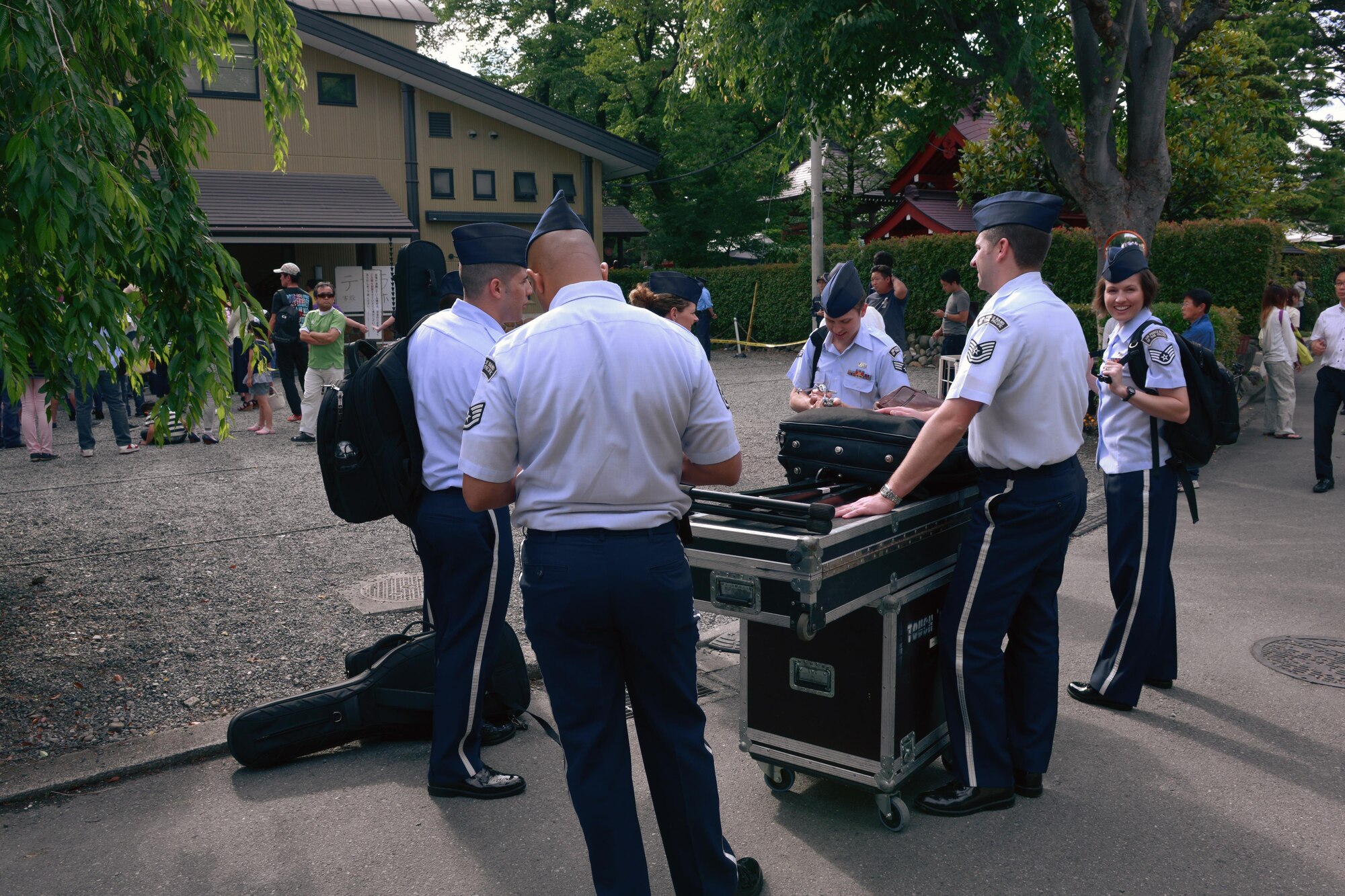 Members of the Band of the Pacific-Asia leave the Inaka Festival at Gyokusen Ji Temple, Akiruno City, Tokyo, Japan, June 5, 2016. The Band of the Pacific-Asia performed five songs for the festivalgoers and followed it with two encores. (U.S. Air Force photo by Staff Sgt. Cody H. Ramirez/Released)
