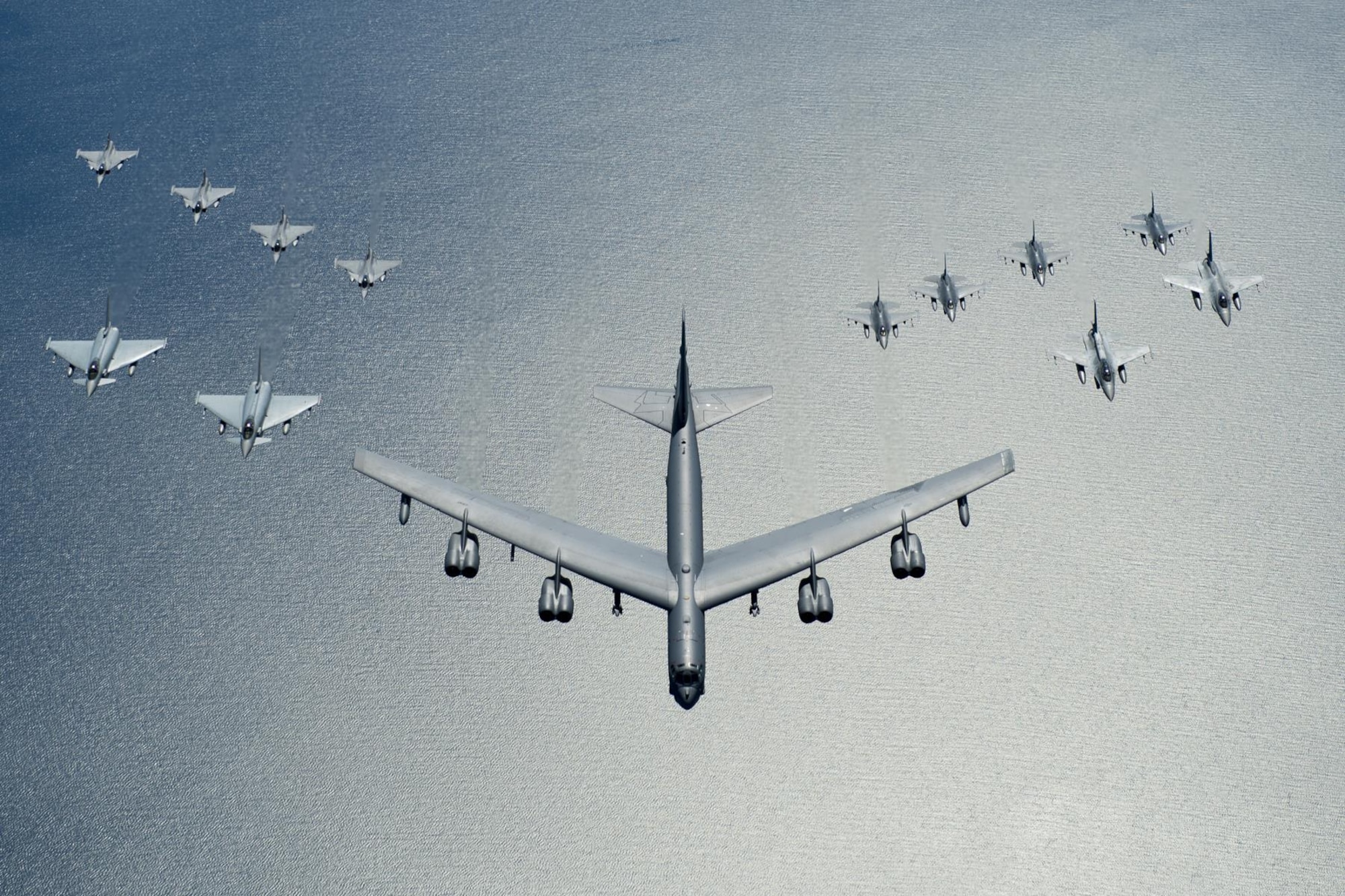 A U.S. Air Force B-52 Stratofortress leads a formation of aircraft including two Polish air force F-16 Fighting Falcons, four U.S. Air Force F-16 Fighting Falcons, two German Eurofighter Typhoons and four Swedish Gripens over the Baltic Sea, June 9, 2016. The formation was captured from a KC-135 from the 434th Air Refueling Wing, Grissom Air Force Base, Indiana as part of exercise BALTOPS 2016. (U.S. Air Force photo/Senior Airman Erin Babis)