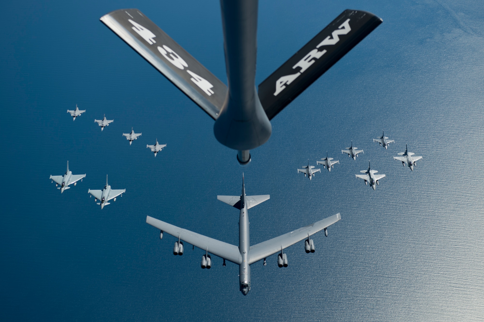 A U.S. Air Force B-52 Stratofortress leads a formation of aircraft including two Polish air force F-16 Fighting Falcons, four U.S. Air Force F-16 Fighting Falcons, two German Eurofighter Typhoons and four Swedish Gripens over the Baltic Sea, June 9, 2016. The formation was captured from a KC-135 from the 434th Air Refueling Wing, Grissom Air Force Base, Indiana as part of exercise BALTOPS 2016. (U.S. Air Force photo/Senior Airman Erin Babis)