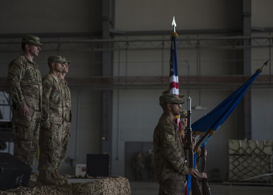 Airman from the 455th Air Expeditionary Wing Honor Guard post the colors during the 455th AEW change of command ceremony at Bagram Airfield, Afghanistan, June 03, 2016. The base honor guard’s primary tasking is to honor the fallen and support unit and morale functions. (U.S. Air Force photo by Senior Airman Justyn M. Freeman)