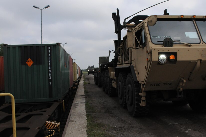 A PLS truck retrieves containers from the port for Exercise Anakonda 16 to deliver to the 592nd Ordnance for processing and distribution at the Drawsko Pomorskie Training Area
