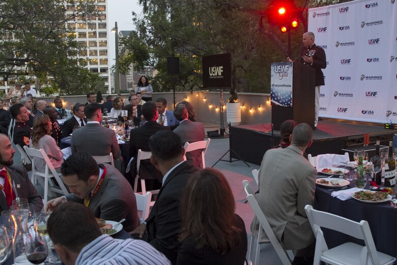 Brigadier Gen. Paul Kennedy speaks to attendees of the U.S. Wrestling Foundation Gala in Los Angeles, June 9, 2016. The Marine Corps joined a host of VIPs in in sending off Team USA as they compete in the World Cup, their last competition before the Olympic Games in Rio de Janeiro and awarded two young future leaders at the gala. Marine recruiters view combat sports (professional and amateur wrestling and mixed martial arts) as excellent programming venues to reach a large portion of the Marine Corps’ enlisted and officer recruiting prospects. Principles taught to student wrestlers such as discipline, physical fitness, aggressive attitude and mental and physical toughness align with Marine Corps principles.