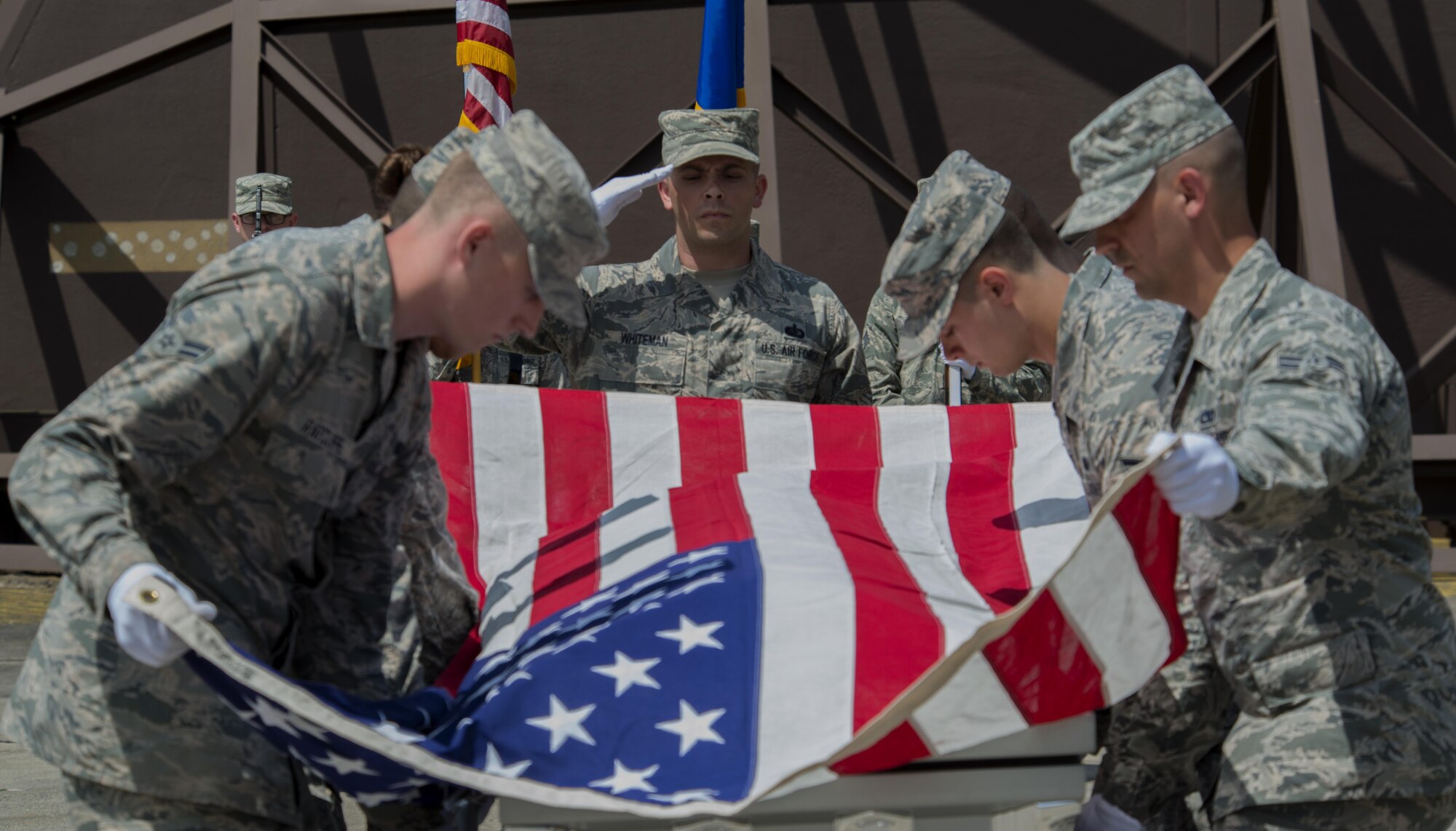 Graduates from the Air Education and Training Command’s Class 5 Basic Protocol, Honors and Ceremonies Course participate in a funeral ceremony demonstration as part of the graduation ceremony June 9, 2016, at Ramstein Air Base, Germany. The course was established to provide training and procedural guidance for rendering proper military funeral honors. It emphasized the importance of military customs and courtesies, dress and appearance and drill and ceremony. (U.S. Air Force photo/Airman 1st Class Tryphena Mayhugh)