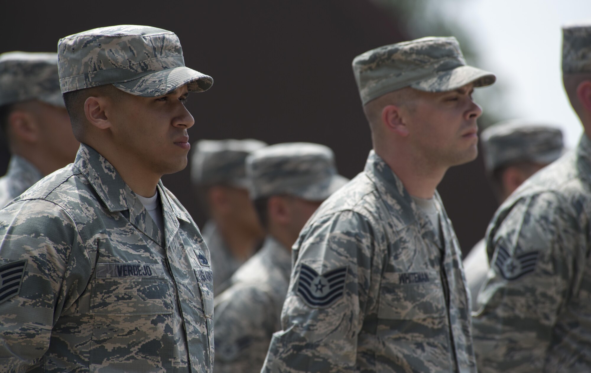 Graduates from the Air Education and Training Command’s Class 5 Basic Protocol, Honors and Ceremonies Course prepare to receive their diplomas during the graduation ceremony June 9, 2016, at Ramstein Air Base, Germany. The graduating class consisted of Airmen from Aviano Air Base, Italy; Royal Air Force Station Mildenhall, United Kingdom; Incirlick Air Base, Turkey and Ramstein. They completed 80 hours of training in pallbearing, firing party, colors and maintenance and wear of the ceremonial uniform. (U.S. Air Force photo/Airman 1st Class Tryphena Mayhugh)