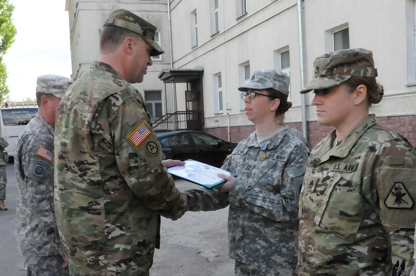 Capt. Elizabeth M. Cochran, with the 364th Expeditionary Sustainment Command, is awarded the Army Achievement Medal for her exceptionally meritorious service during Anakonda 2016 in Warsaw, Poland, June 6. Anakonda 2016 is one of U.S. Army Europe's premier multinational training events, which features 24 nations and seeks to train, exercise and integrate Polish national command and force structures into an allied, joint, multinational environment.