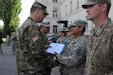Staff Sgt. Chan Ra, with the 364th Expeditionary Sustainment Command, is awarded the Army Achievement Medal for his exceptionally meritorious service during Anakonda 2016 in Warsaw, Poland, June 6. Anakonda 2016 is one of U.S. Army Europe's premier multinational training events, which features 24 nations and seeks to train, exercise and integrate Polish national command and force structures into an allied, joint, multinational environment.