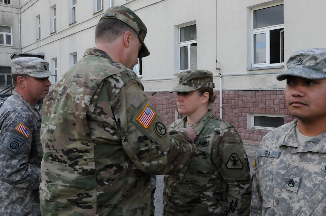 Staff Sgt. Melissa J. Manwell, with the 6th Legal Operations Detachment, is awarded the Army Achievement Medal for her exceptionally meritorious service during Anakonda 2016 in Warsaw, Poland, June 6. Anakonda 2016 is one of U.S. Army Europe's premier multinational training events, which features 24 nations and seeks to train, exercise and integrate Polish national command and force structures into an allied, joint, multinational environment.
