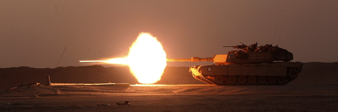 Marines with Tank Platoon, Battalion Landing Team 2/6, 26th Marine Expeditionary Unit, fire a multipurpose antitank impact round during a live-fire exercise at Camp Buehring, Kuwait, Feb. 23. The 26th MEU is embarked with the Kearsarge Amphibious Ready Group and is deployed to maintain regional security in the U.S. 5th Fleet area of operations. (U.S. Marine Corps photo by Staff Sgt. Bobby J. Yarbrough/Released)