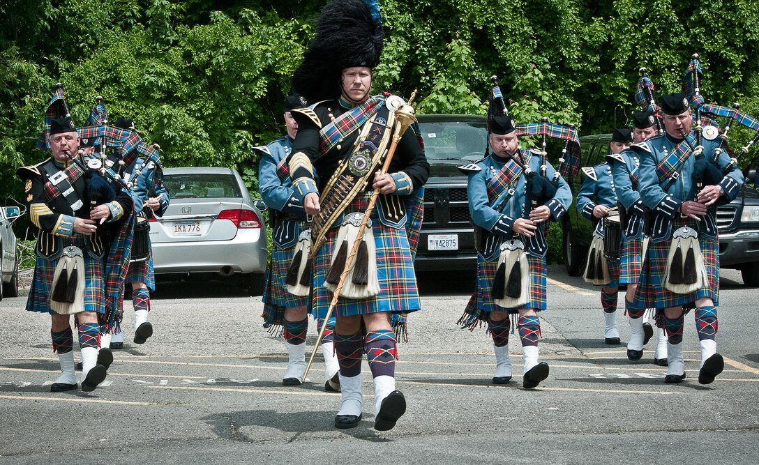 Members of the Massachusetts State Police Pipe and Drum Corps march in ahead of the Soldiers from the 368th Engineer Battalion in a deployment ceremony at Saint Anselm College in Manchester, N.H. June 2, 2016. Many of the Army Reserve Soldiers in the battalion are from Massachusetts and the greater New England Area. The ceremony is taking place as the unit embarks to pre-deployment training at Ft. Bliss, Texas before deploying to Kuwait in support of Operation Enduring Freedom. (U.S. Army Photo by Spc. Stephen Doherty)
