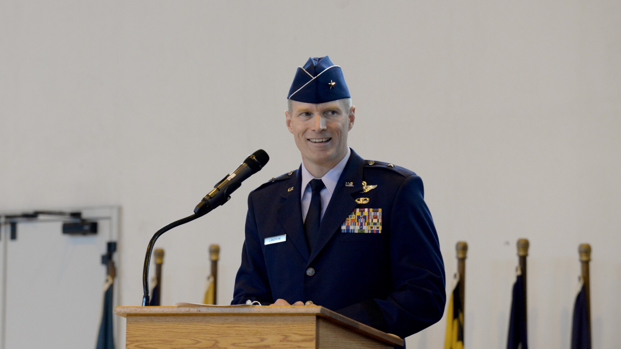 Brig. Gen. Lance Landrum, 31st Fighter Wing commander, speaks to Team Aviano members during the 31st FW change of command ceremony, June 10, 2016, at Aviano Air Base, Italy. During the ceremony, Landrum became the 14th commander to take command of the 31st FW since it relocated to Aviano, Italy, from Homestead, Fla. (U.S. Air Force photo by Airman 1st Class Cary Smith/Released)